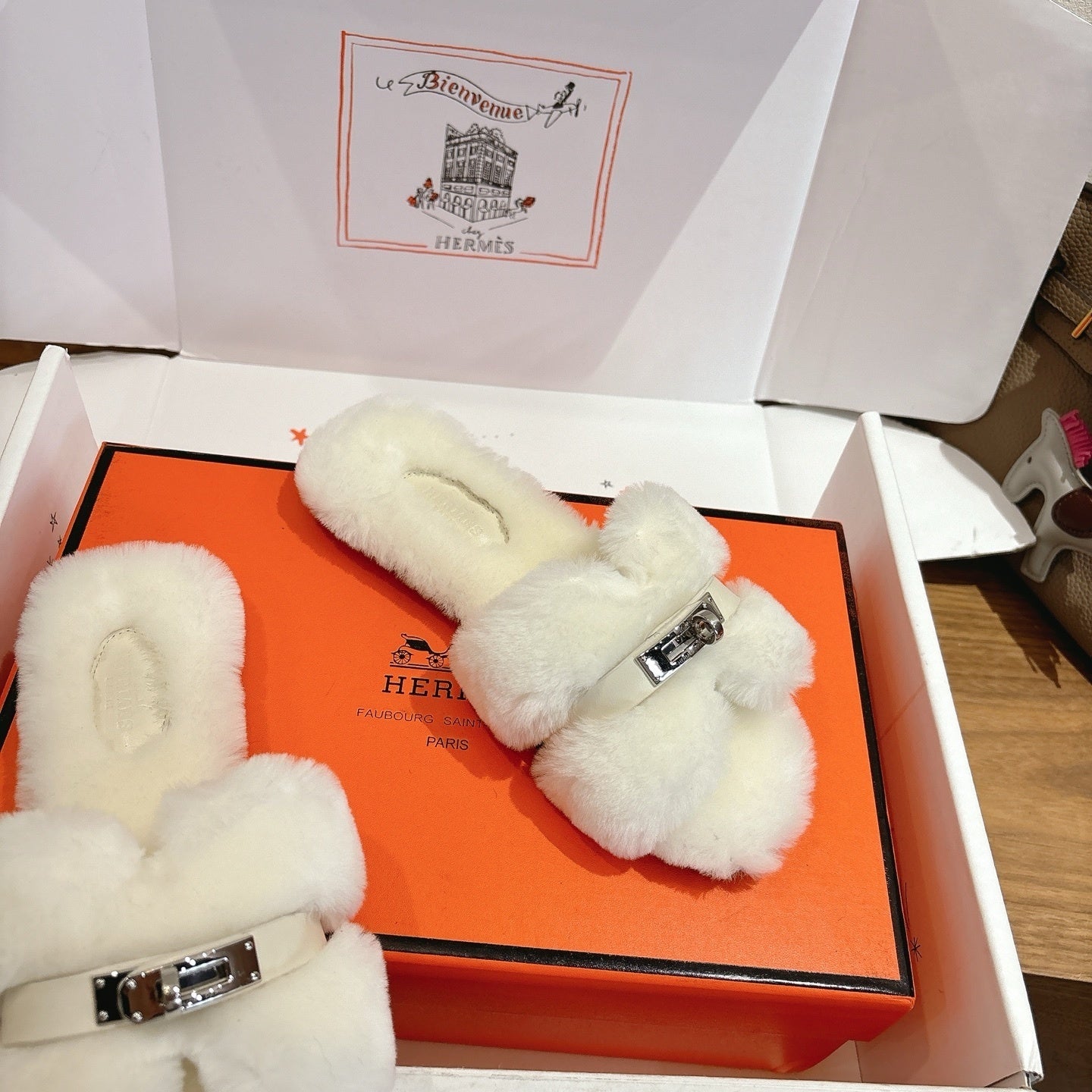 IVORY FAUX FUR MULE SLIPPERS WITH SILVER-TONE ACCENT