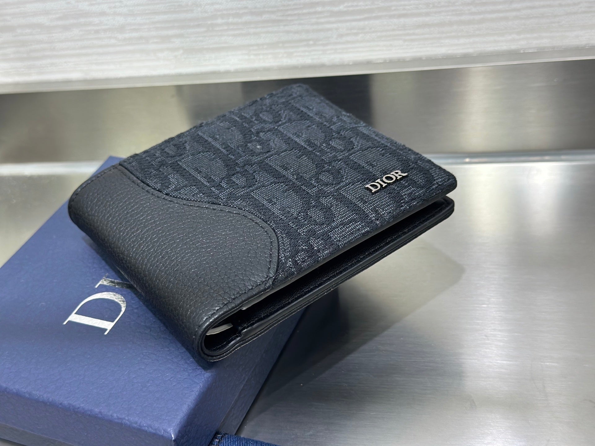BLACK LEATHER AND CANVAS BIFOLD WALLET WITH TEXTURED MONOGRAM