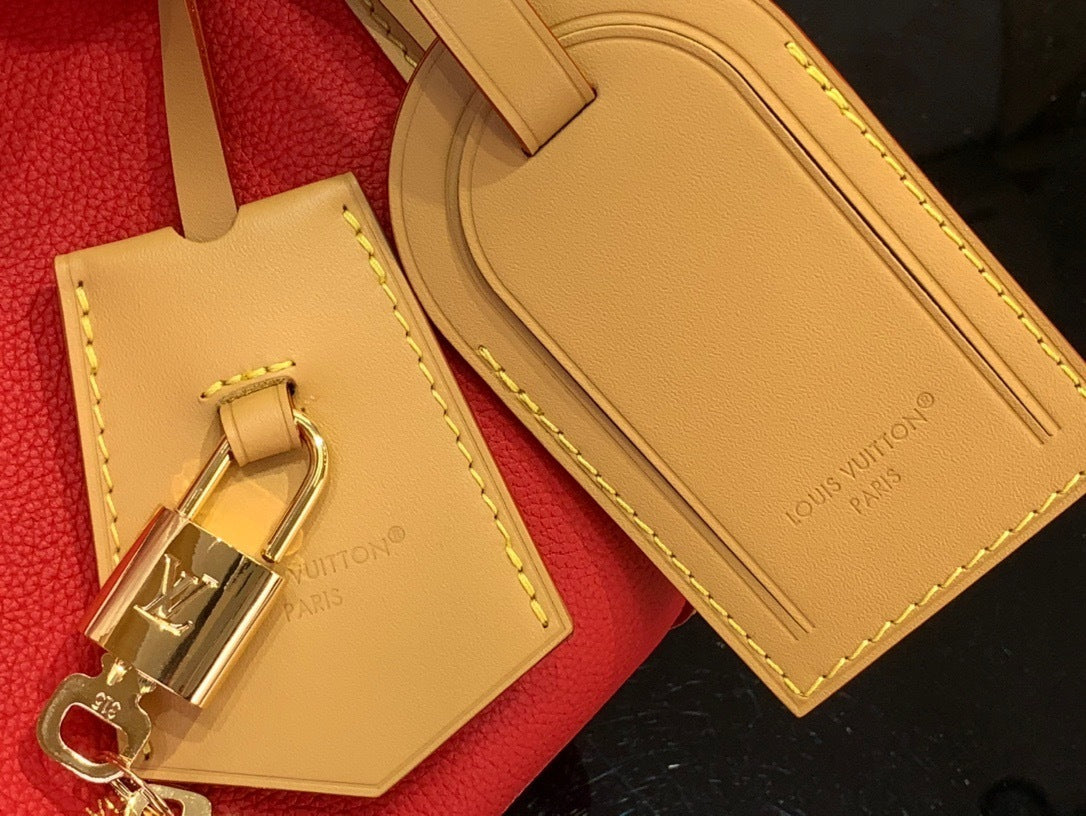 SOFT CYLINDER CROSSBODY BAG