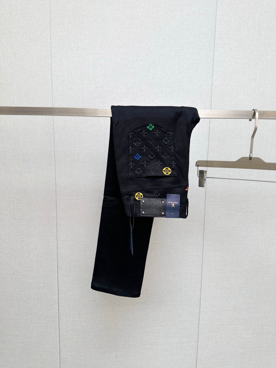 BLACK DENIM JEANS WITH EMBROIDERED DETAILING