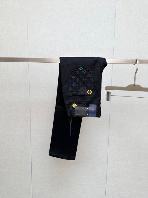 BLACK DENIM JEANS WITH EMBROIDERED DETAILING