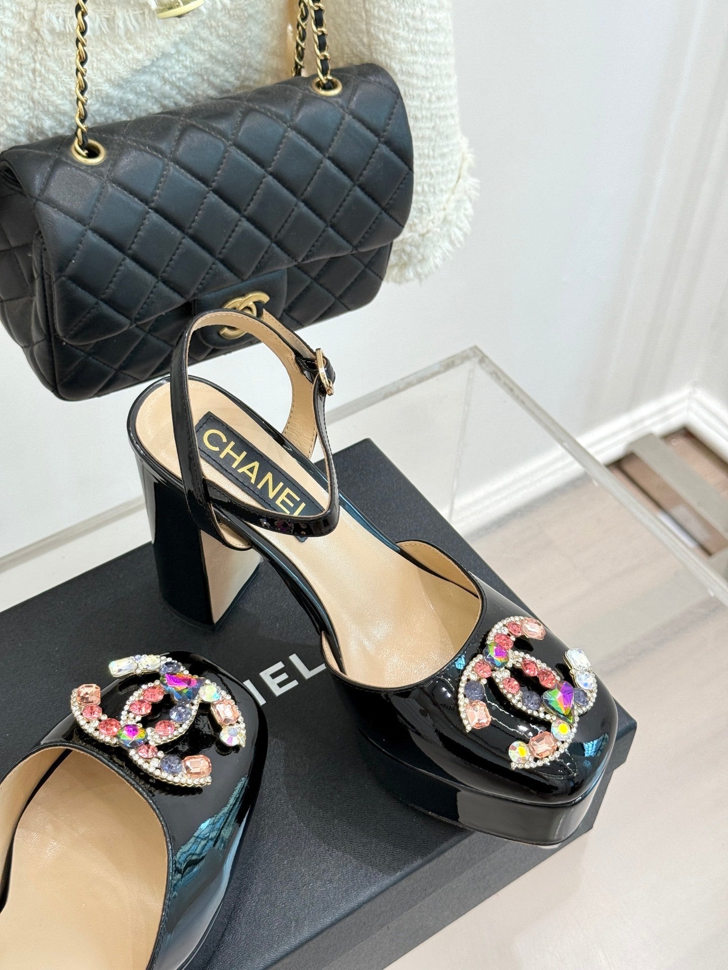 BLACK PATENT PLATFORM CRYSTAL HEELS