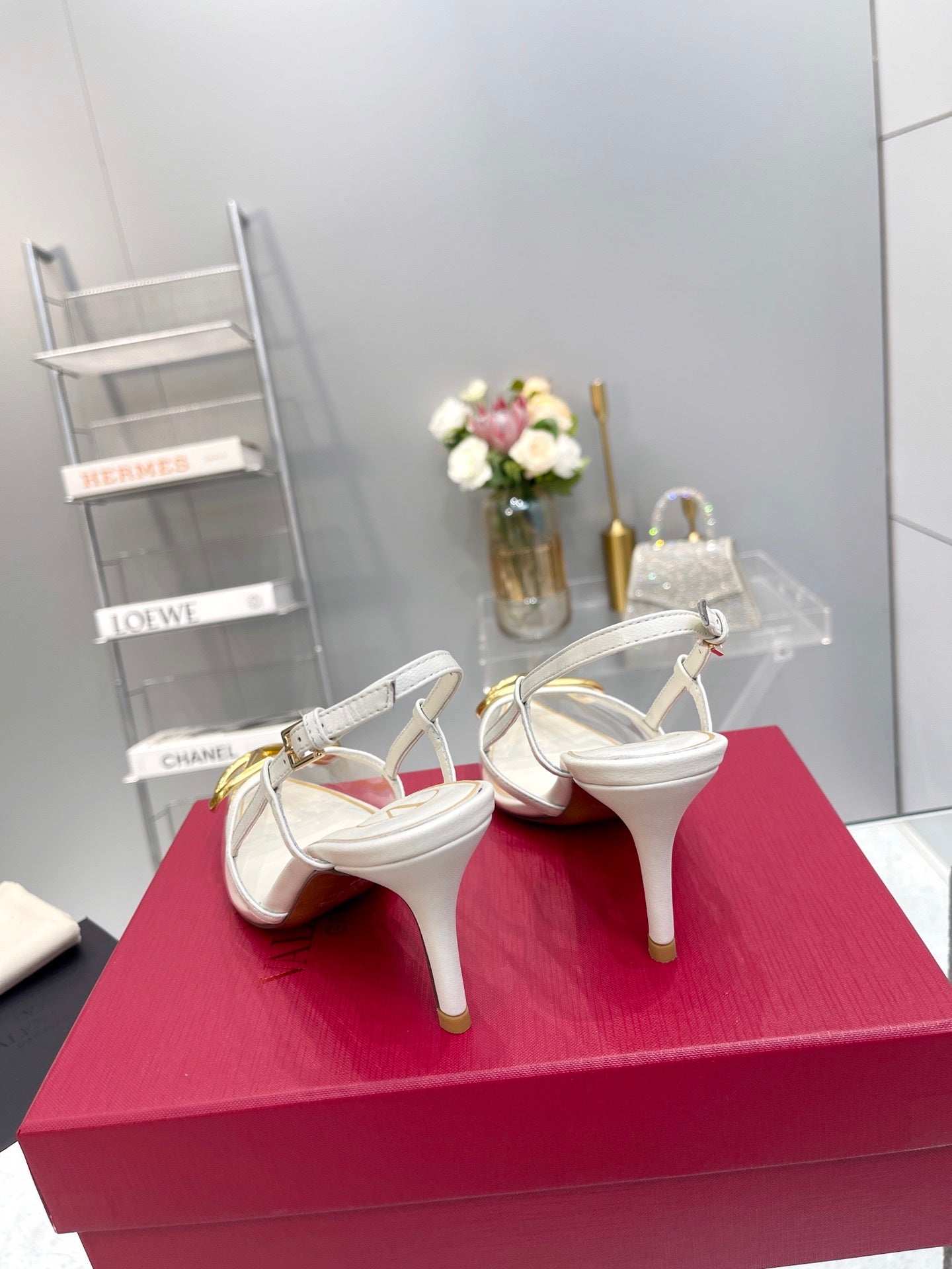 CLEAR SLINGBACK HEELS – ELEGANT WHITE WITH GOLD LOGO DETAIL
