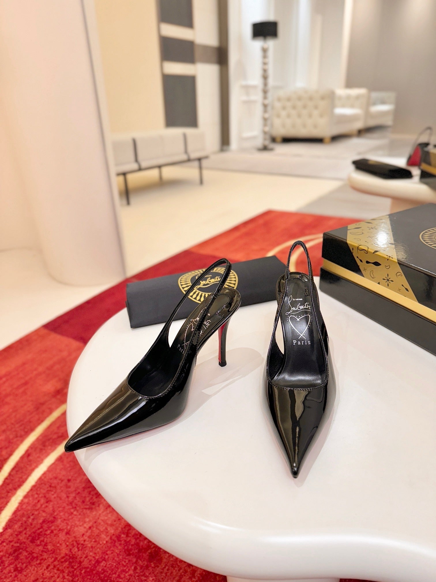 BLACK PATENT SLINGBACK POINTED HEELS