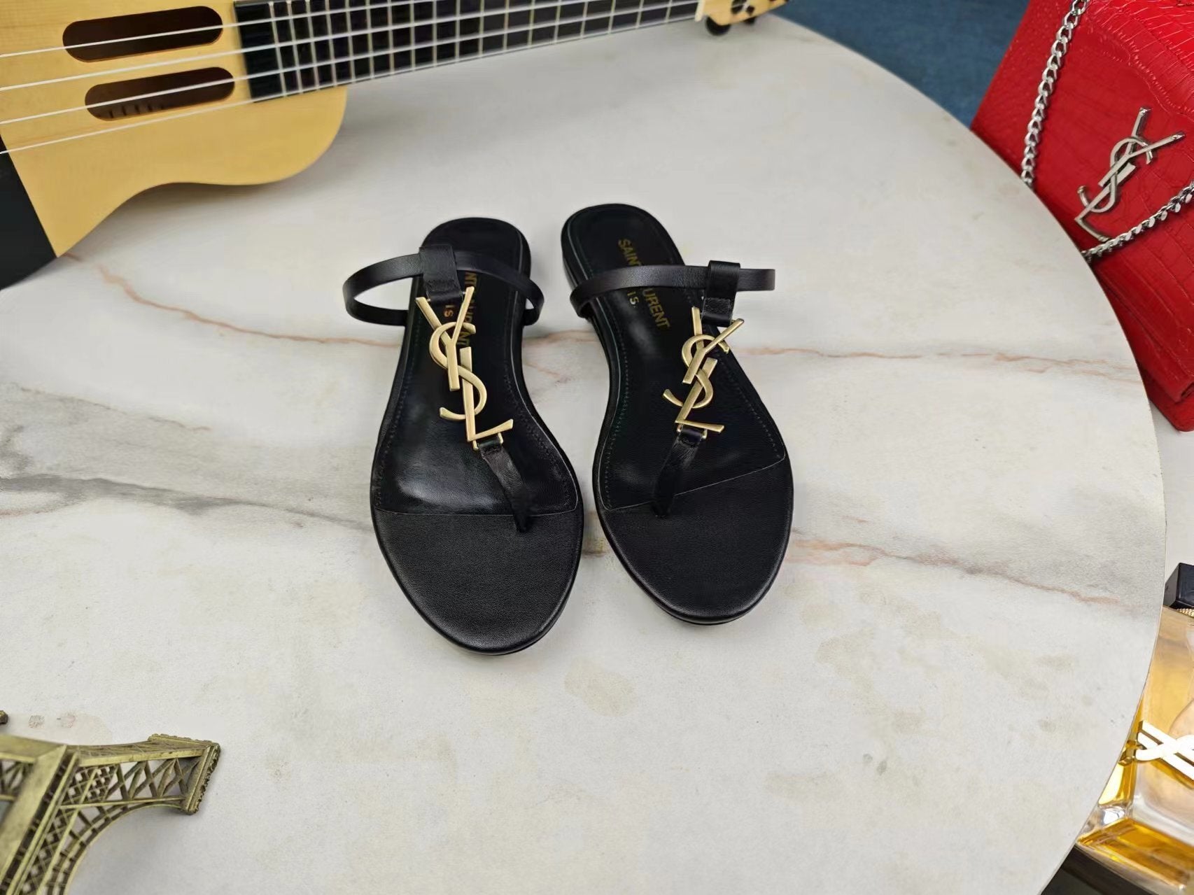 BLACK FLAT SANDALS WITH GOLD ACCENT