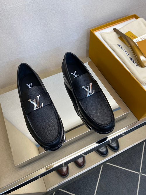 BLACK LEATHER SLIP-ON LOAFERS WITH METAL DETAIL