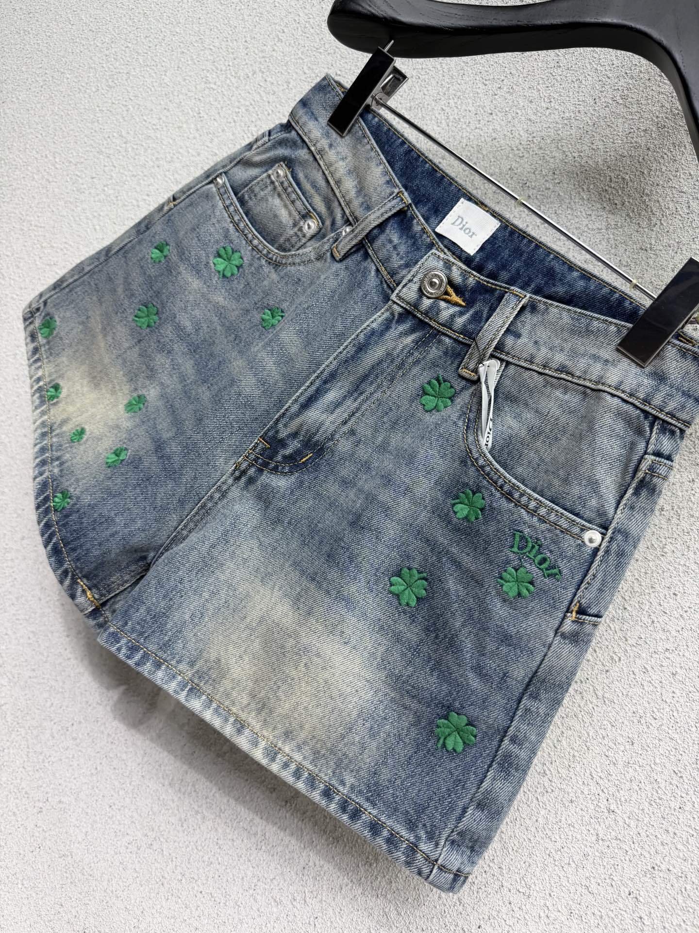 BLUE DENIM SHORTS WITH FLORAL EMBROIDERY