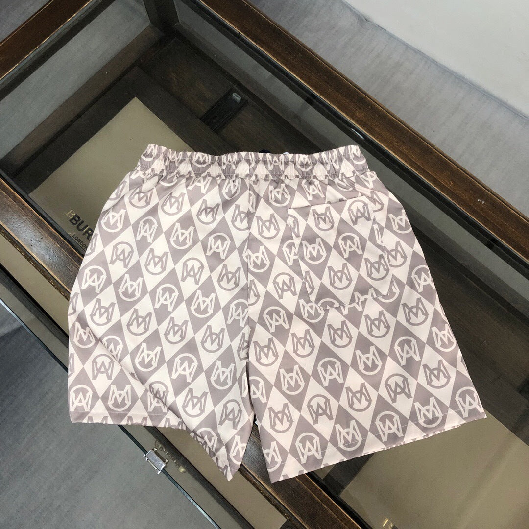 MONOGRAM PRINT SWIM SHORTS