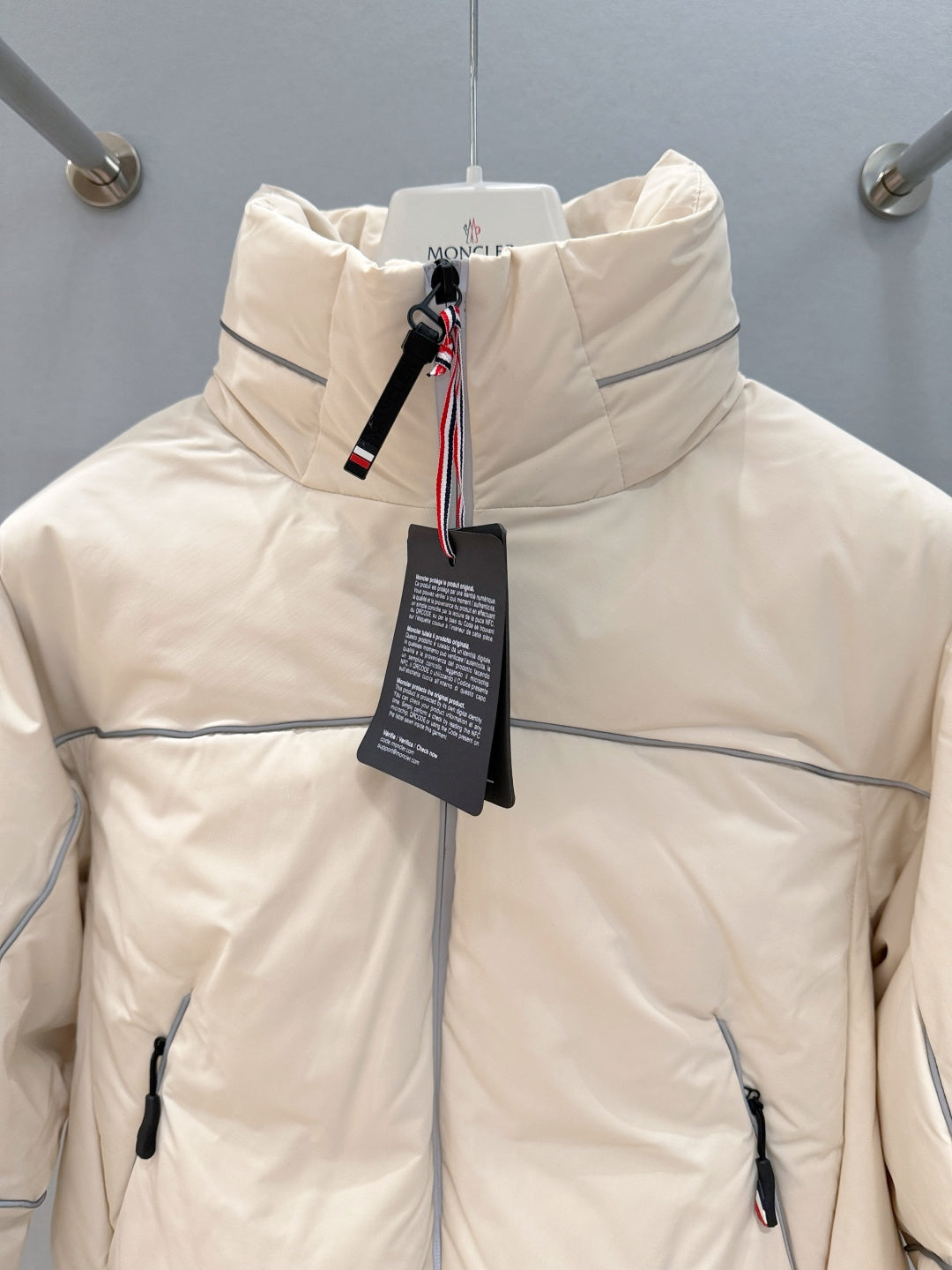 CROPPED PADDED JACKET WITH HIGH COLLAR AND TECH DETAILS