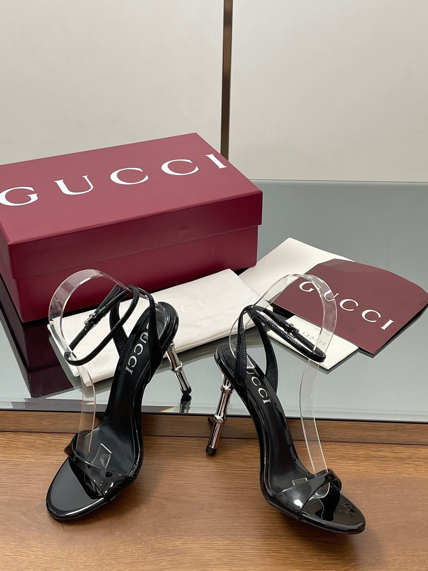 BLACK PATENT STRAPPY HEEL SANDALS WITH METALLIC HEEL