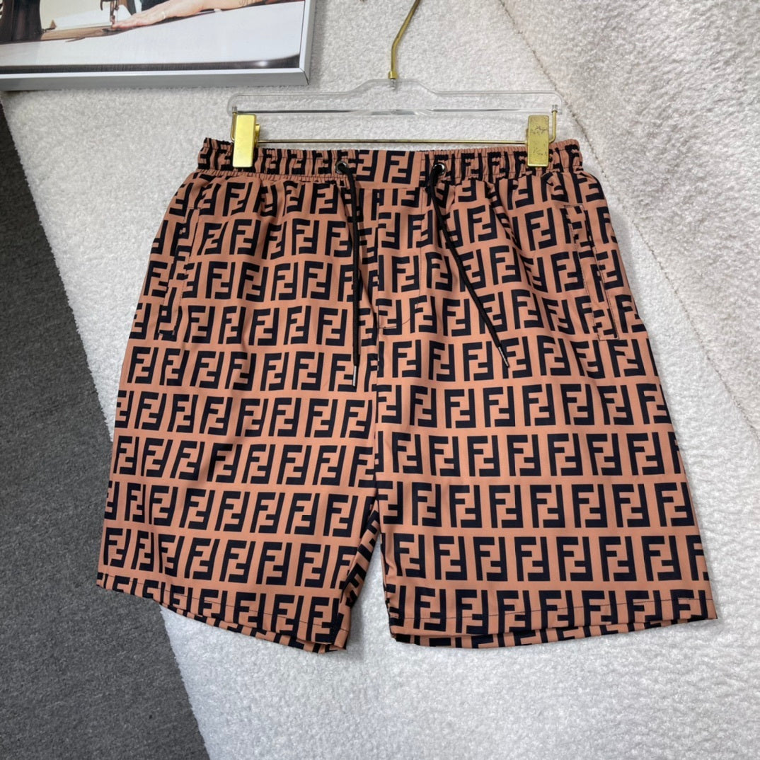 MONOGRAM SWIM SHORTS – BROWN
