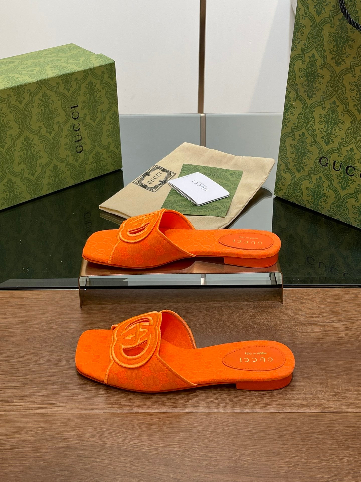 ORANGE EMBOSSED LOGO SLIDES