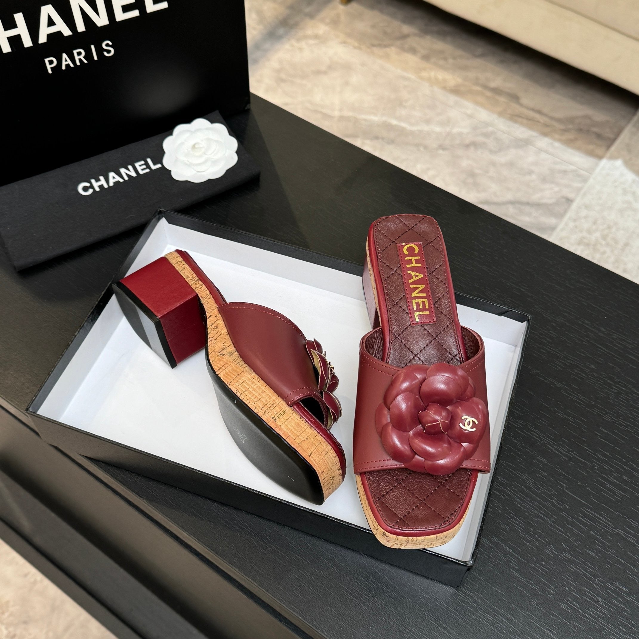 TERRACOTTA QUILTED PLATFORM SLIDE SANDALS WITH FLORAL DETAIL