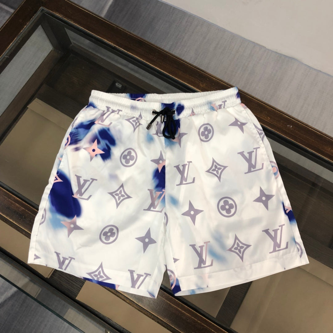 WHITE TIE-DYE PRINT SWIM SHORTS