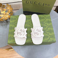 MINIMALIST WHITE SLIDES WITH STATEMENT EMBLEM