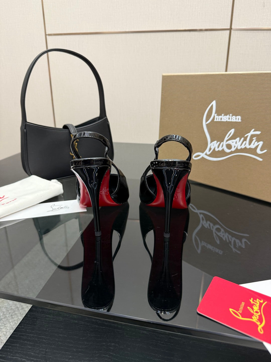 BLACK PATENT SLINGBACK POINTED HEELS
