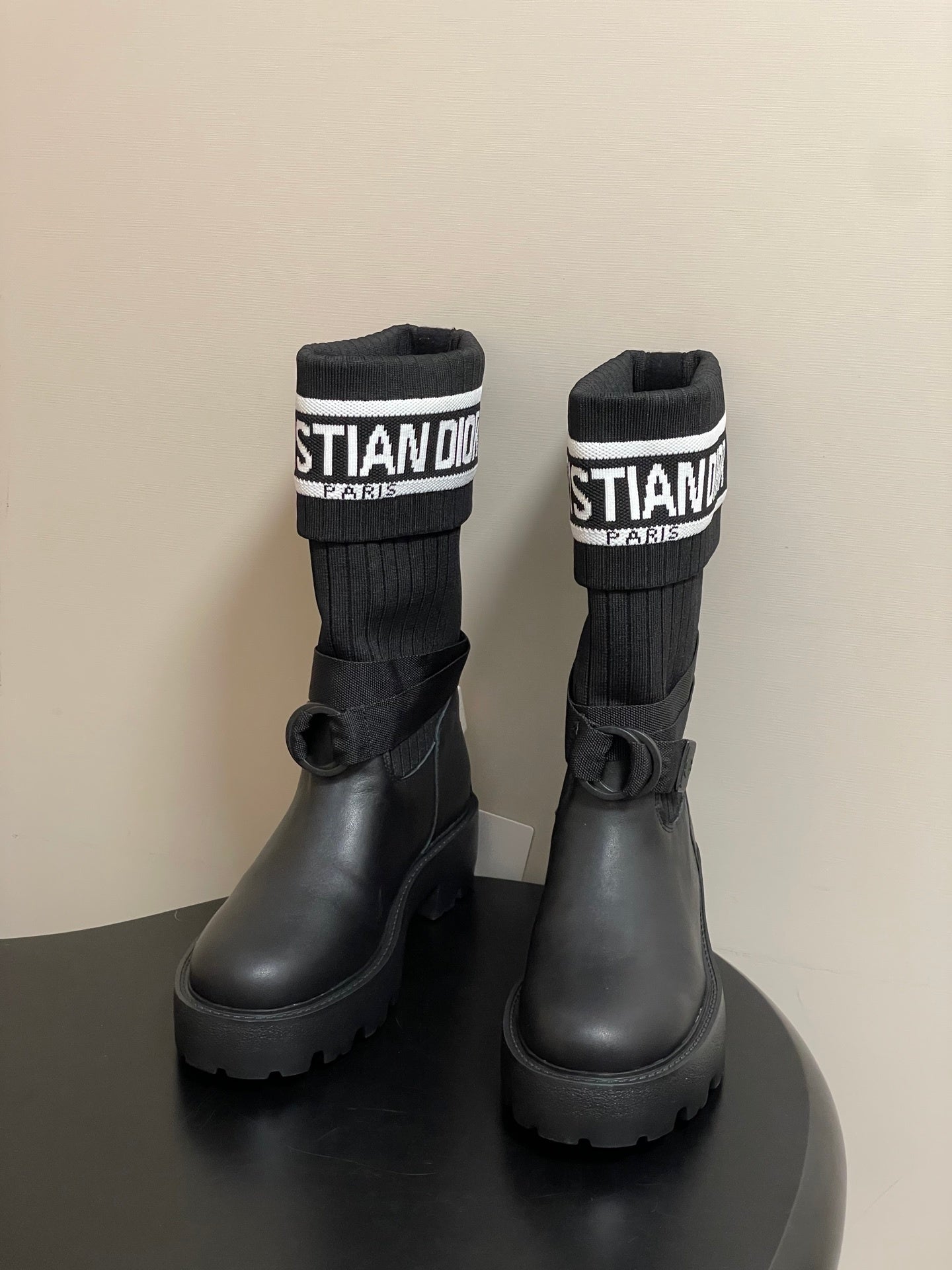 BLACK LEATHER MID-CALF BOOTS WITH RIBBED KNIT CUFF AND LUG SOLE