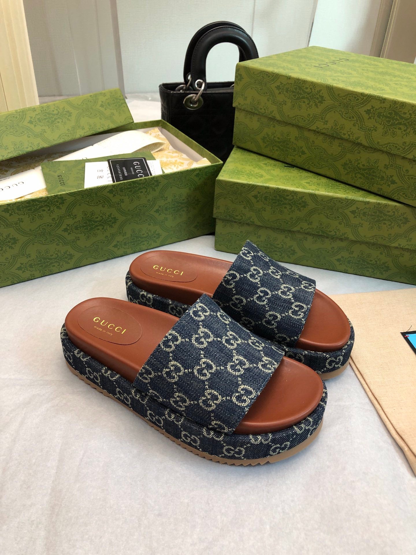 DENIM MONOGRAM PLATFORM SLIDES