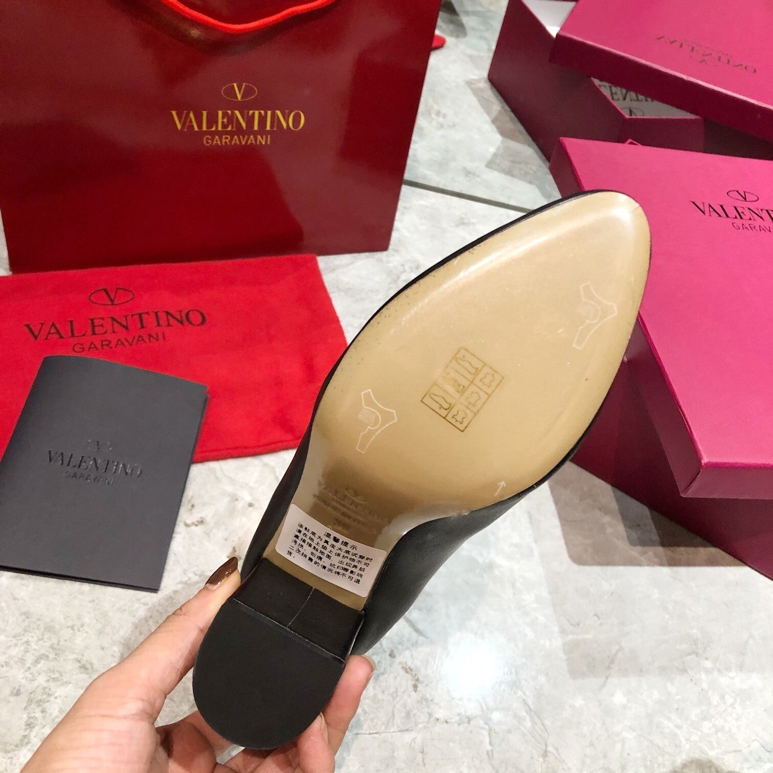 ELEGANT ANKLE BOOTS WITH STATEMENT GOLD V DETAIL