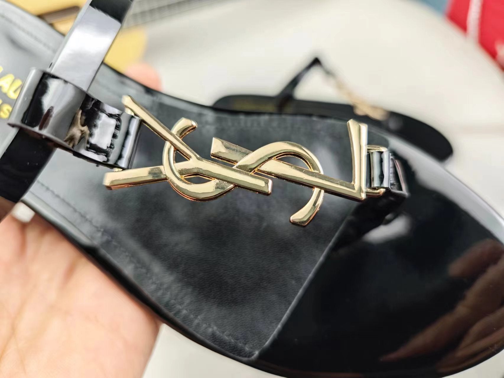 BLACK SLIDE SANDALS WITH GOLD DETAIL