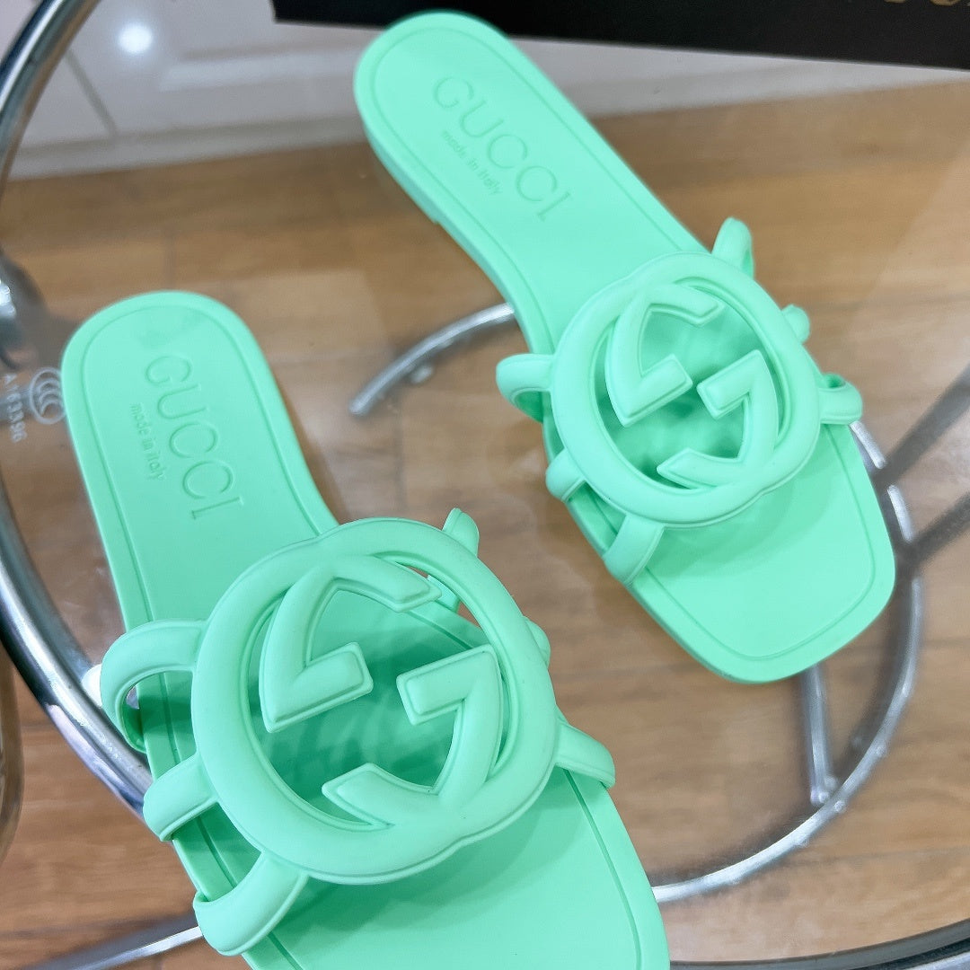 MINT GREEN RUBBER SLIDE SANDALS WITH ROUND EMBLEM