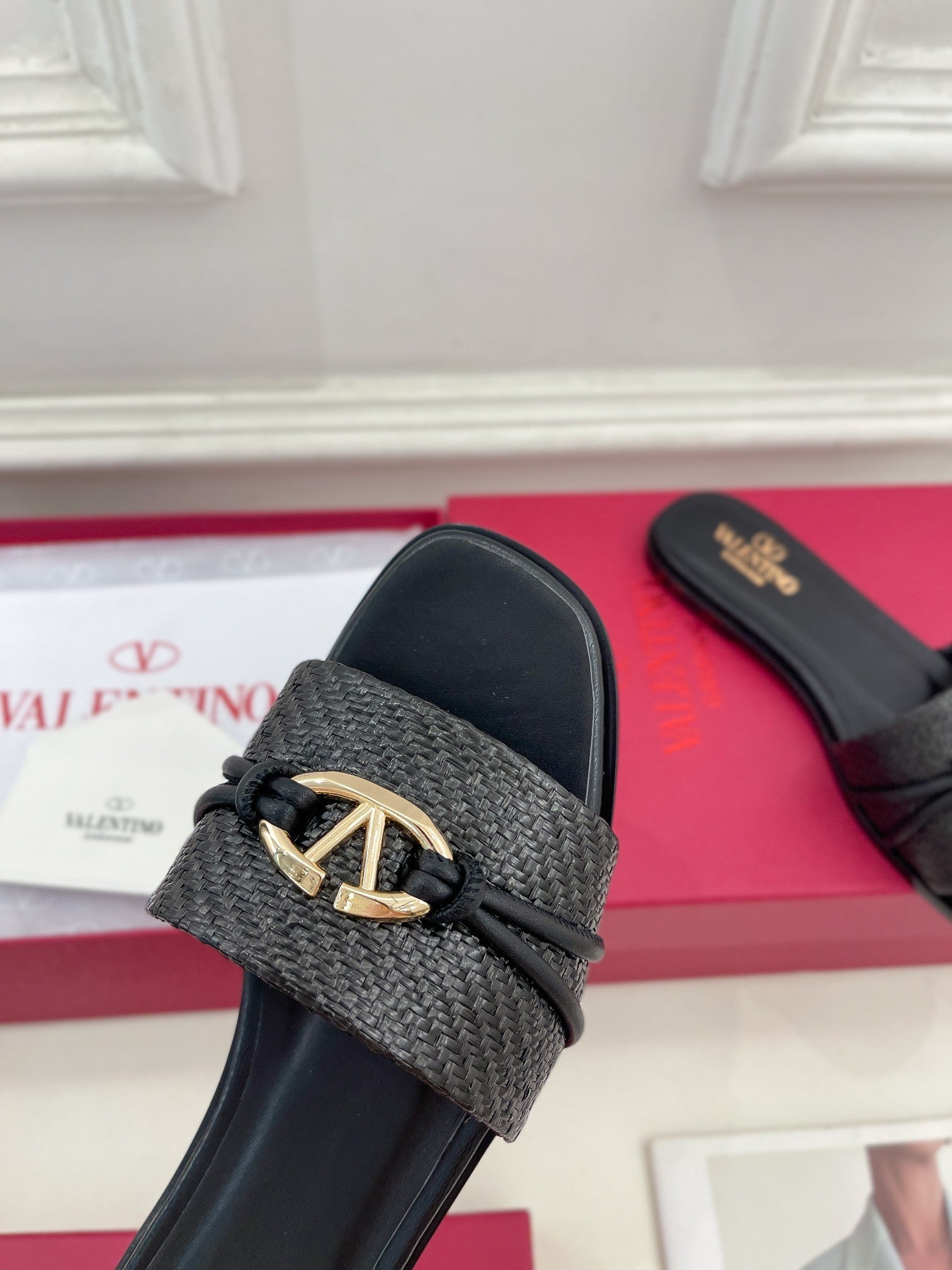 FLAT SLIDE SANDALS – BLACK WOVEN STRAP WITH METAL ACCENT