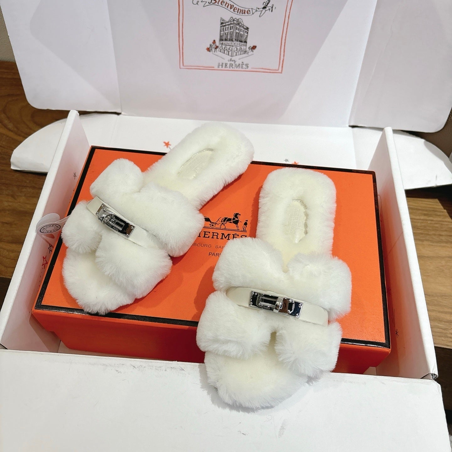 IVORY FAUX FUR MULE SLIPPERS WITH SILVER-TONE ACCENT