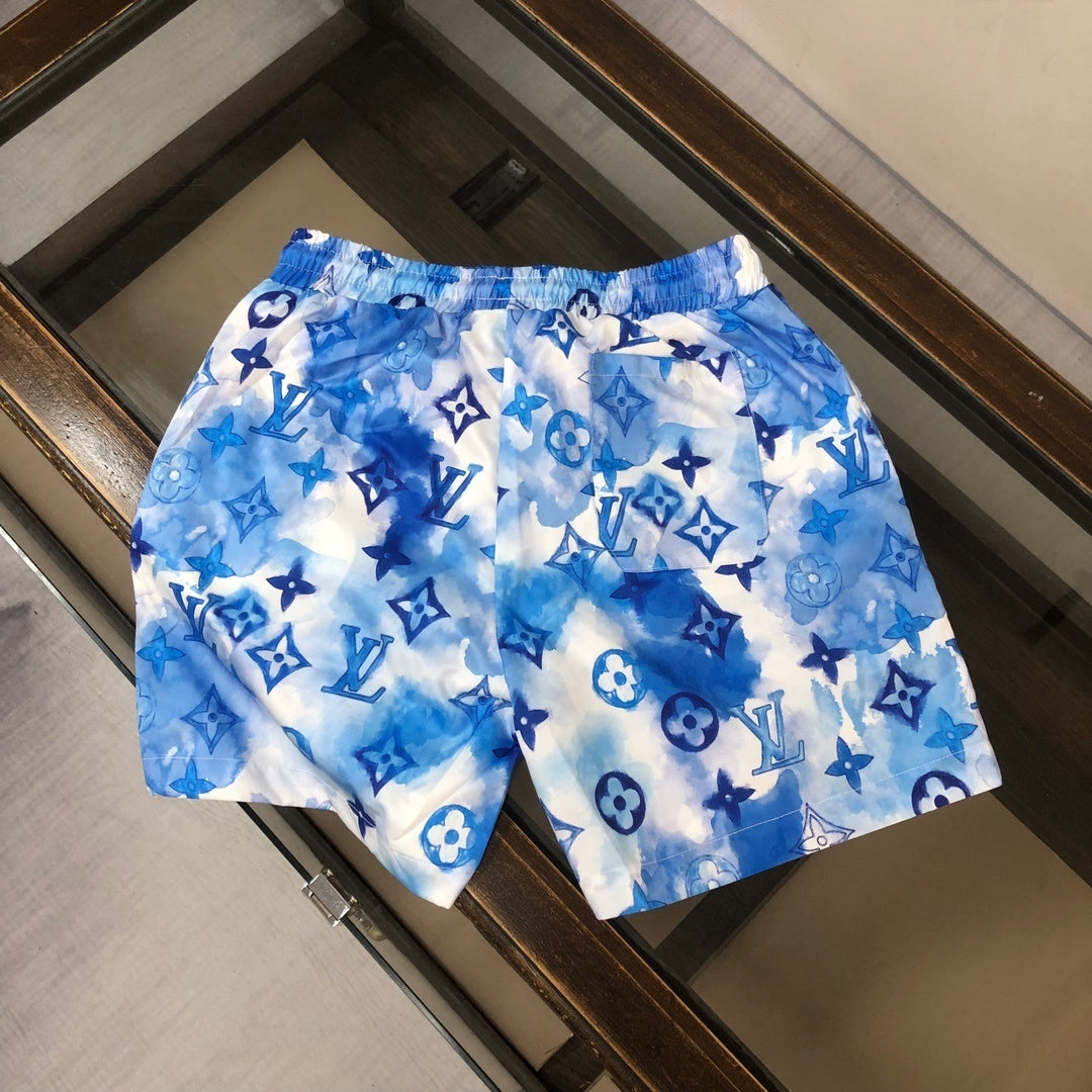 MONOGRAM SWIM SHORTS – BLUE TIE-DYE