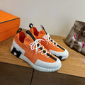 ORANGE TECH-KNIT & SUEDE LOW-TOP SNEAKERS