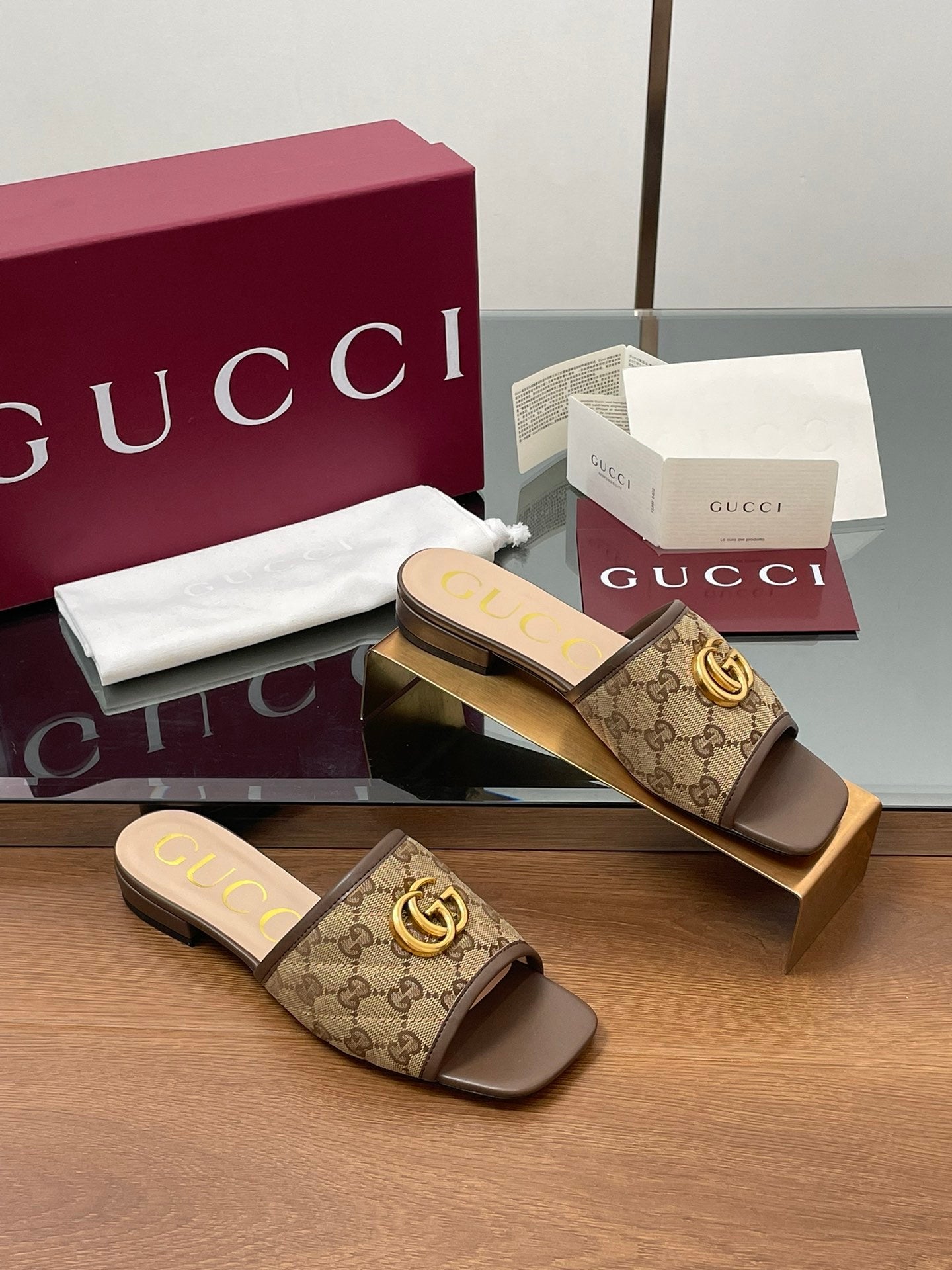 BROWN MONOGRAM FLAT SLIDES