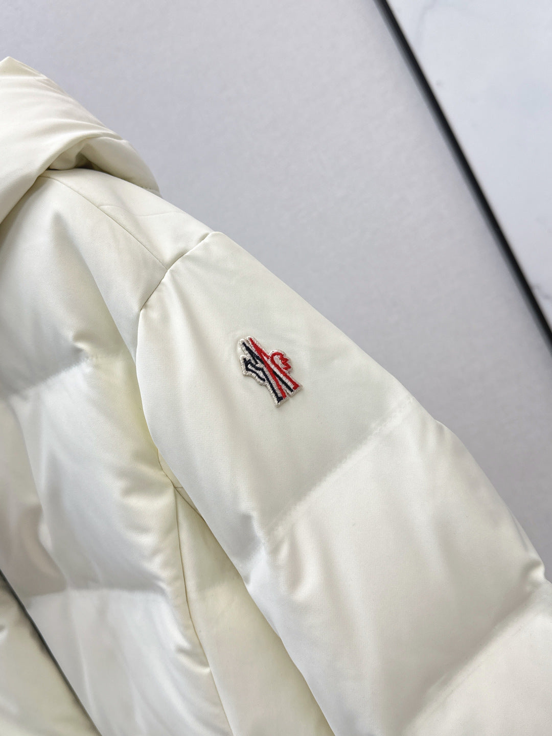 BELTED HOODED QUILTED PUFFER JACKET