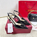 POINTED TOE SLINGBACK HEELS – BLACK PATENT WITH STATEMENT BUCKLE