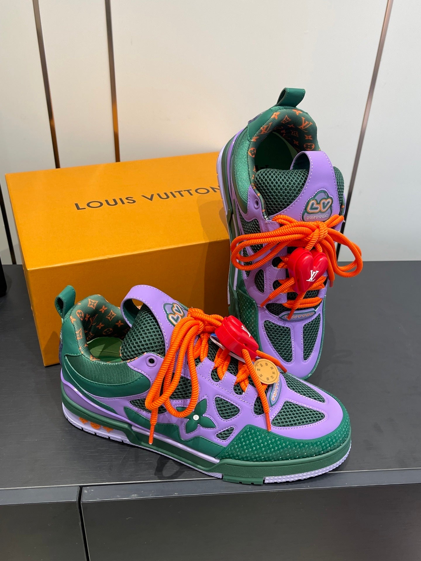 BOLD COLORBLOCK SNEAKERS WITH OVERSIZED LACES AND CHARM DETAIL