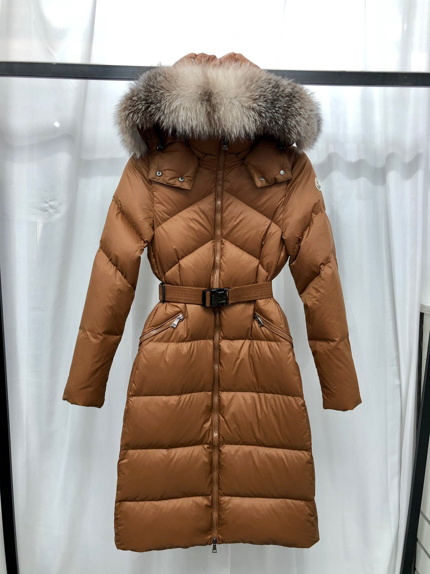 WOMEN’S BELTED LONG QUILTED WINTER COAT WITH FAUX FUR HOOD