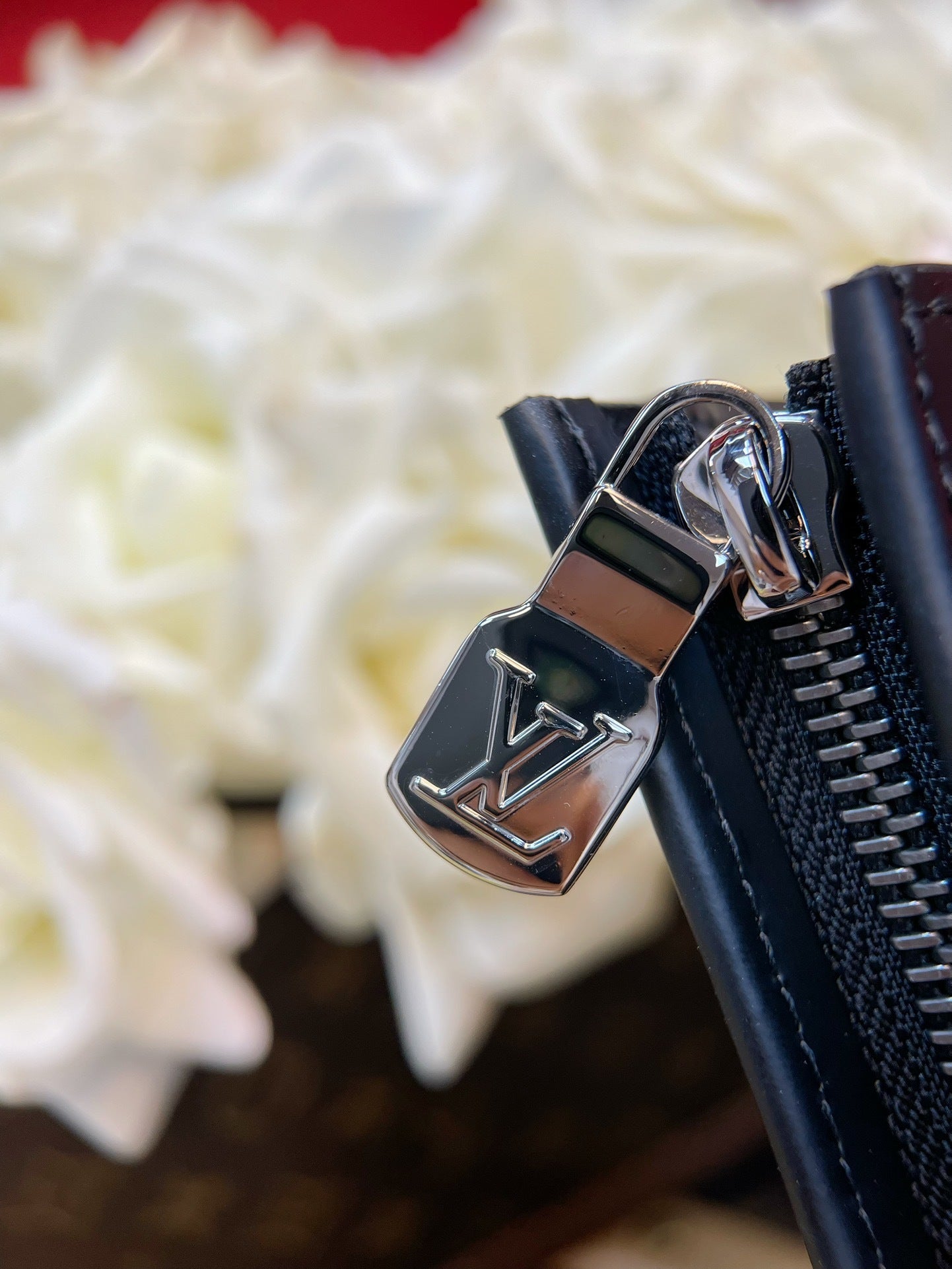 MONOGRAM ZIP POUCH CLUTCH