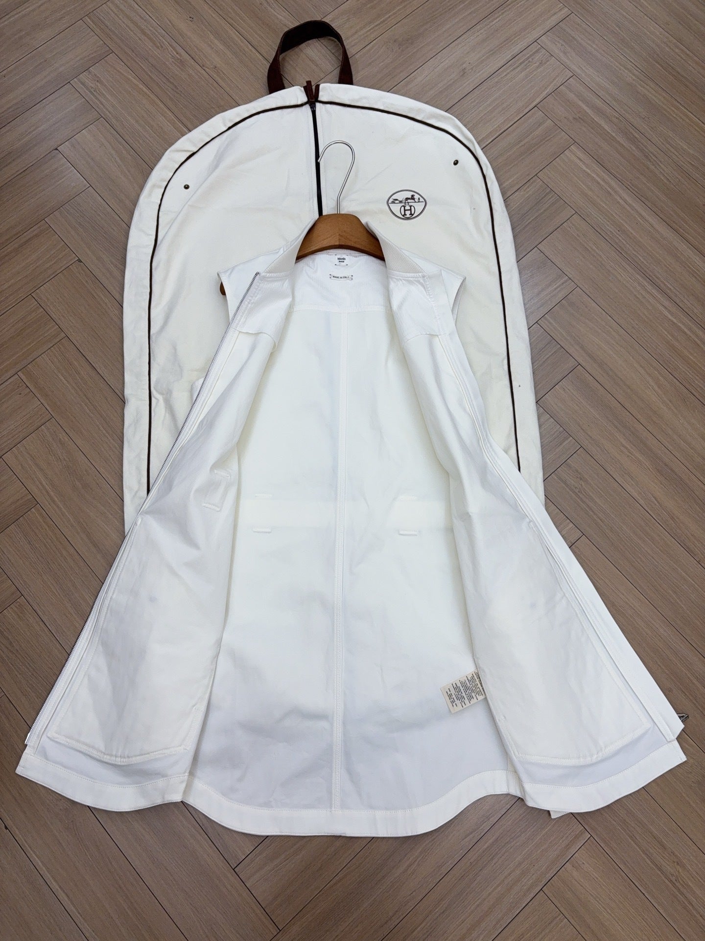 QUILTED ZIP-FRONT SLEEVELESS VEST WITH BELTED DETAIL