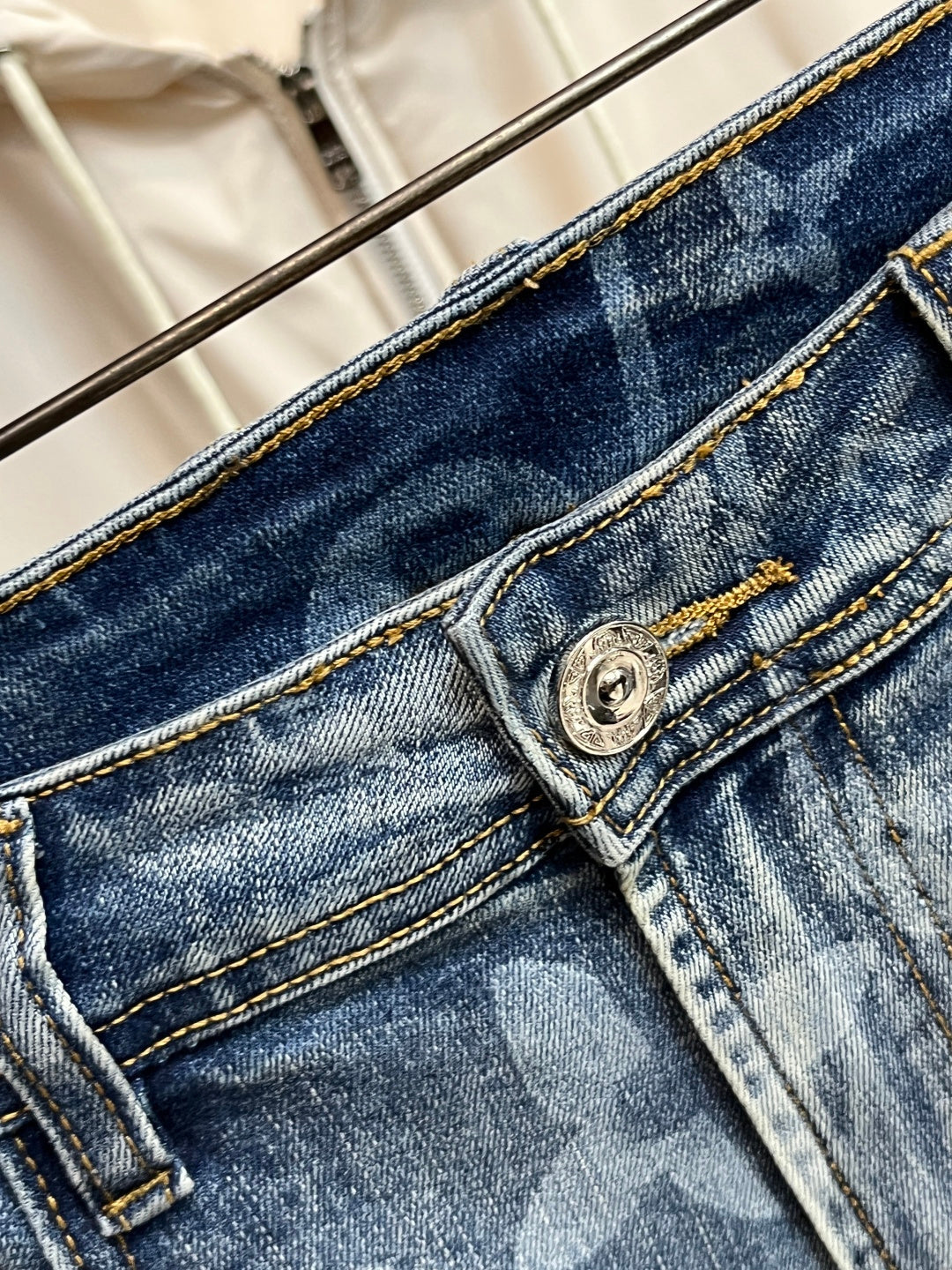 BLUE WASHED DENIM JEANS WITH MONOGRAM PATTERN