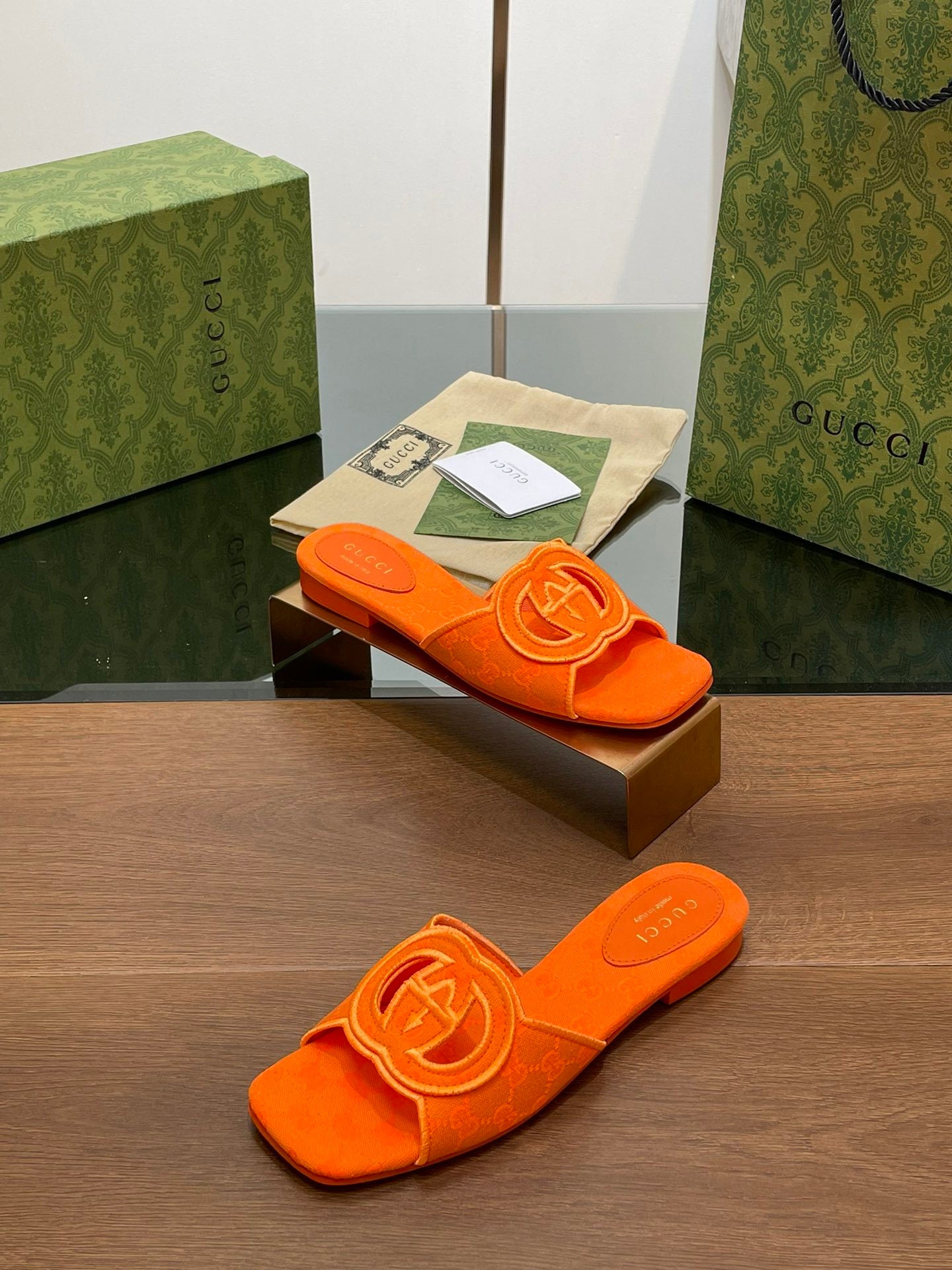 ORANGE EMBOSSED LOGO SLIDES