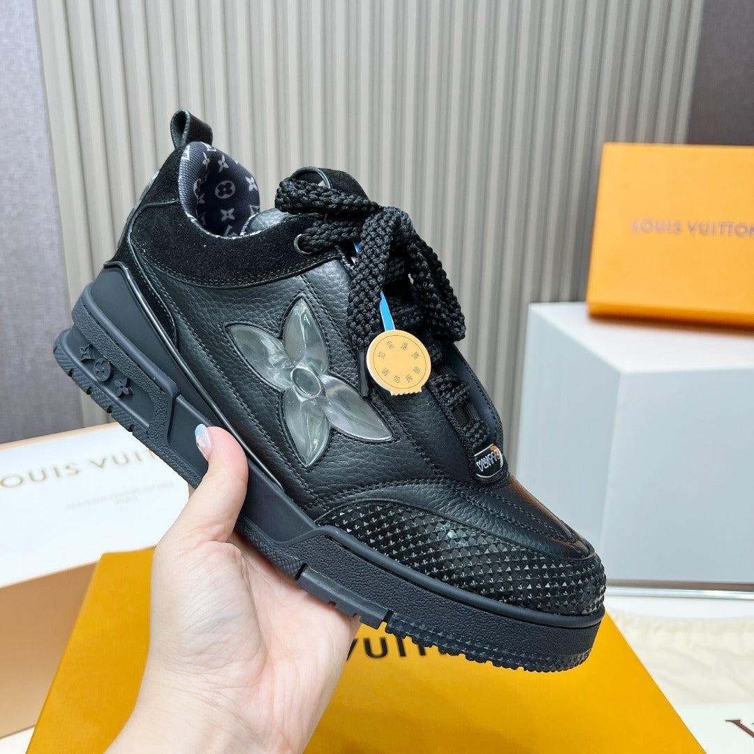 BLACK LEATHER PLATFORM SNEAKERS WITH TRANSLUCENT FLOWER DETAIL