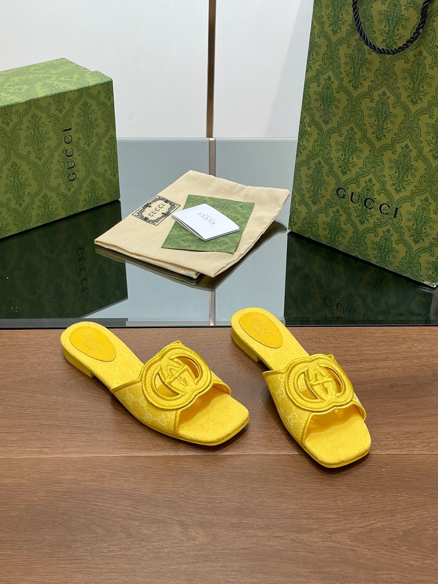 YELLOW EMBOSSED LOGO SLIDES