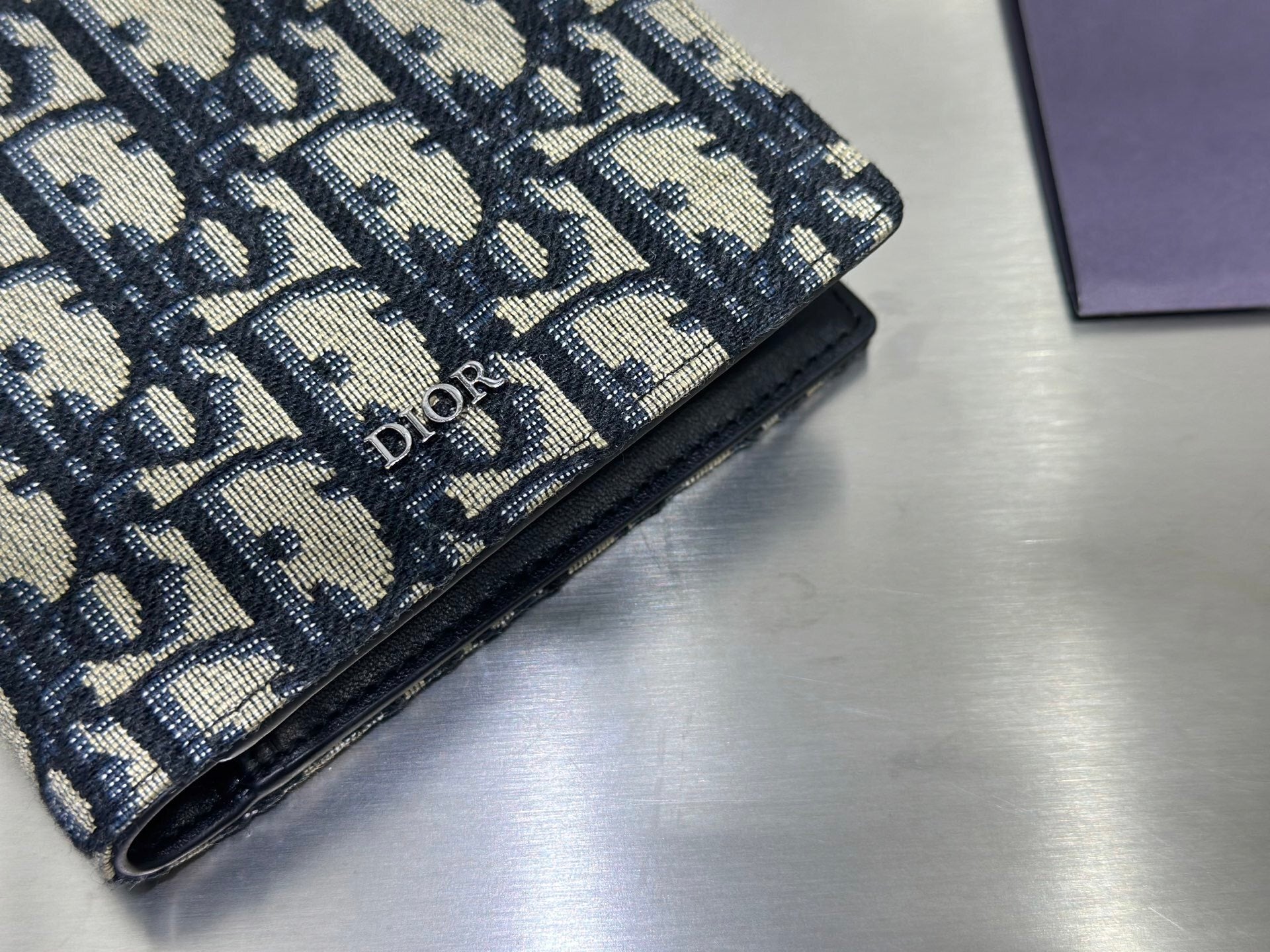 NAVY CANVAS BIFOLD WALLET WITH MONOGRAM PATTERN