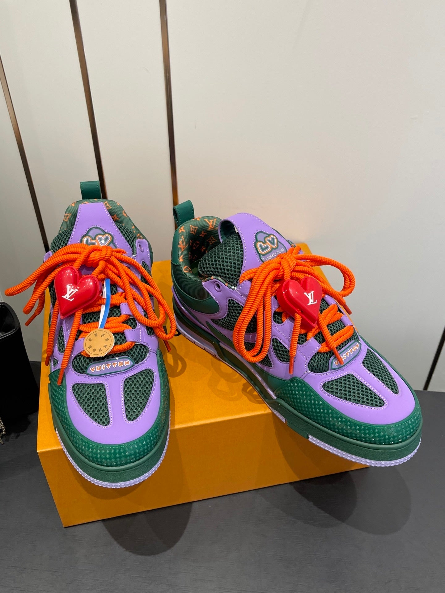 BOLD COLORBLOCK SNEAKERS WITH OVERSIZED LACES AND CHARM DETAIL