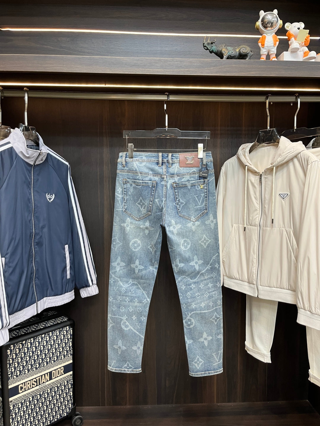 BLUE WASHED DENIM JEANS WITH MONOGRAM PATTERN