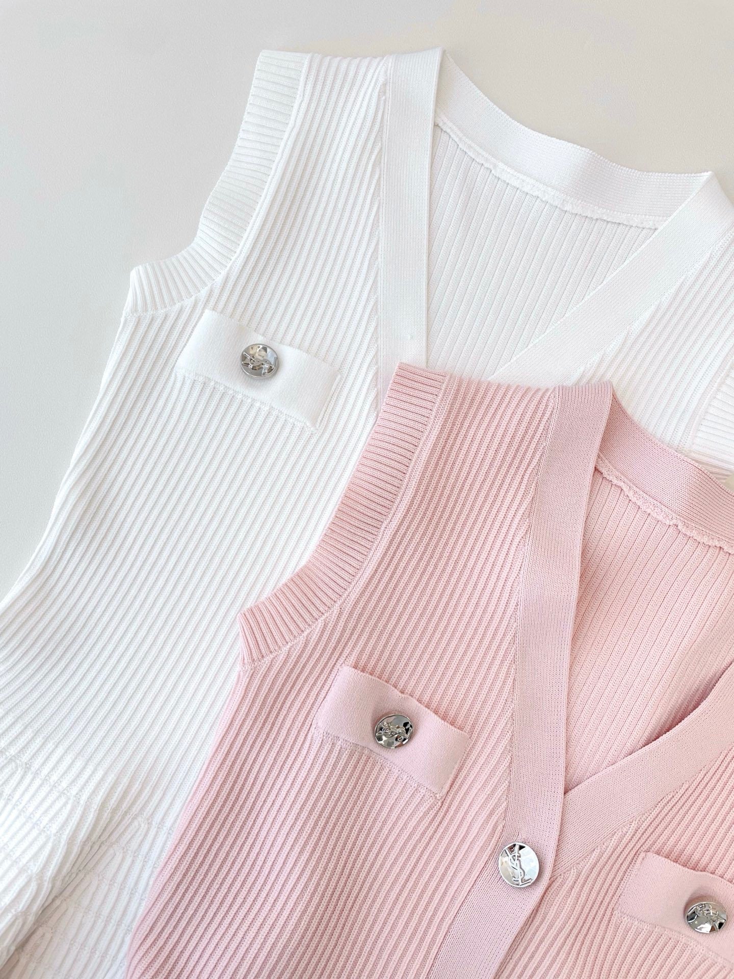 RIBBED PEPLUM KNIT TOP – BUTTON DETAIL