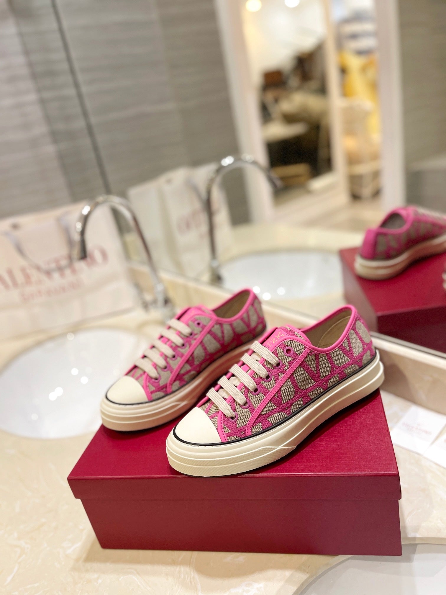 PINK MONOGRAM LOW-TOP SNEAKERS