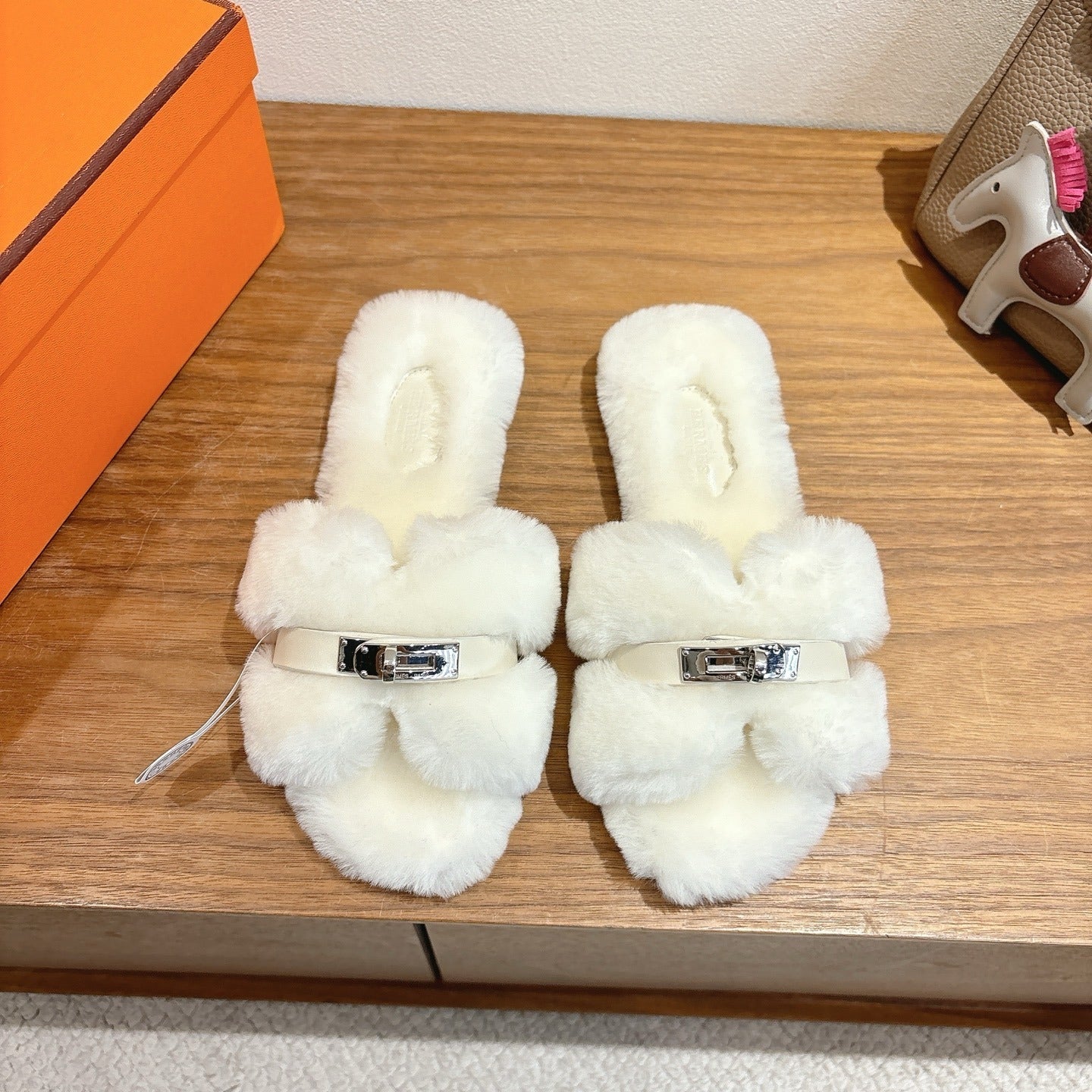 IVORY FAUX FUR MULE SLIPPERS WITH SILVER-TONE ACCENT