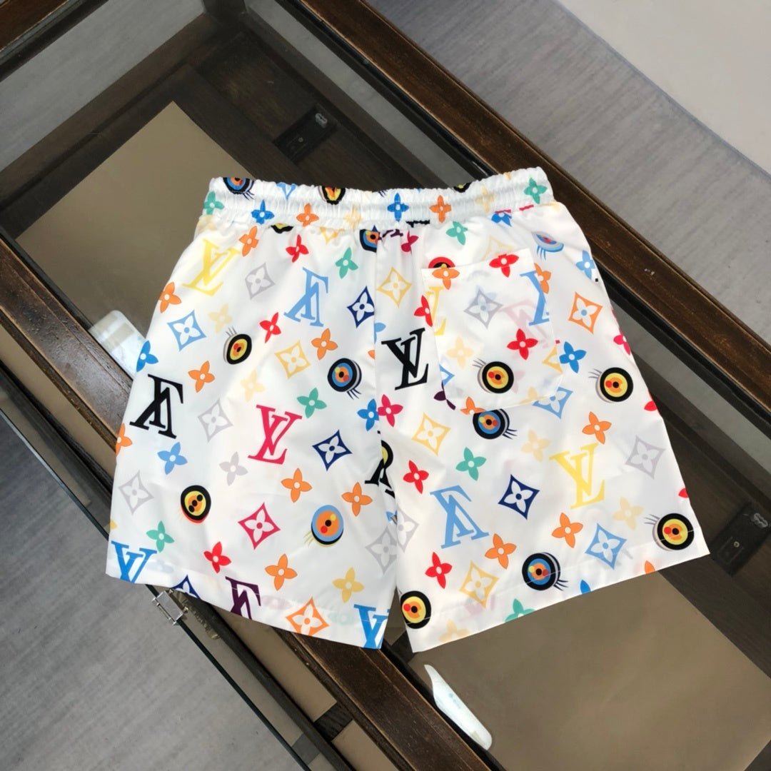 WHITE MULTICOLOR PRINT SWIM SHORTS