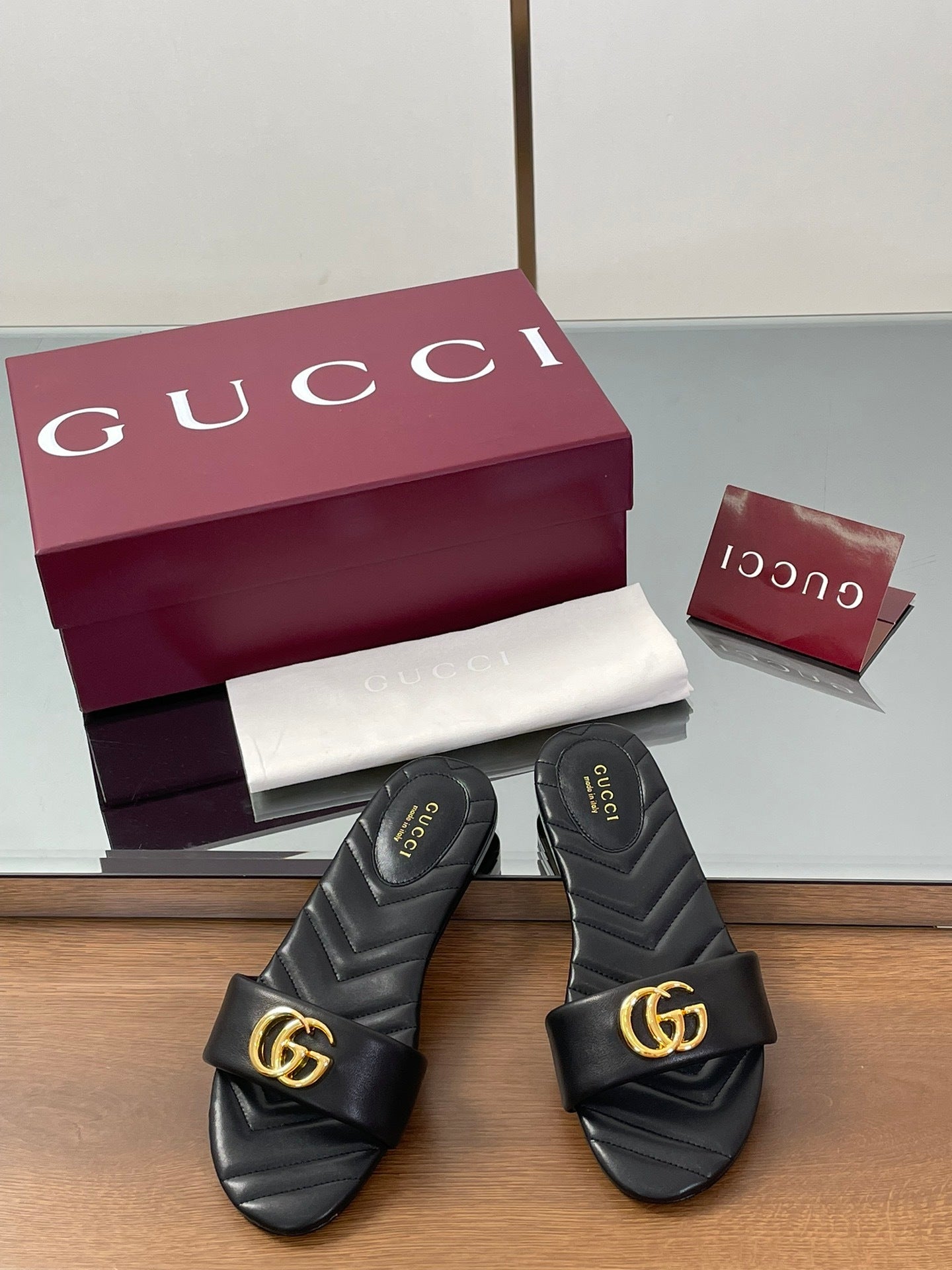 BLACK QUILTED SLIDE SANDALS