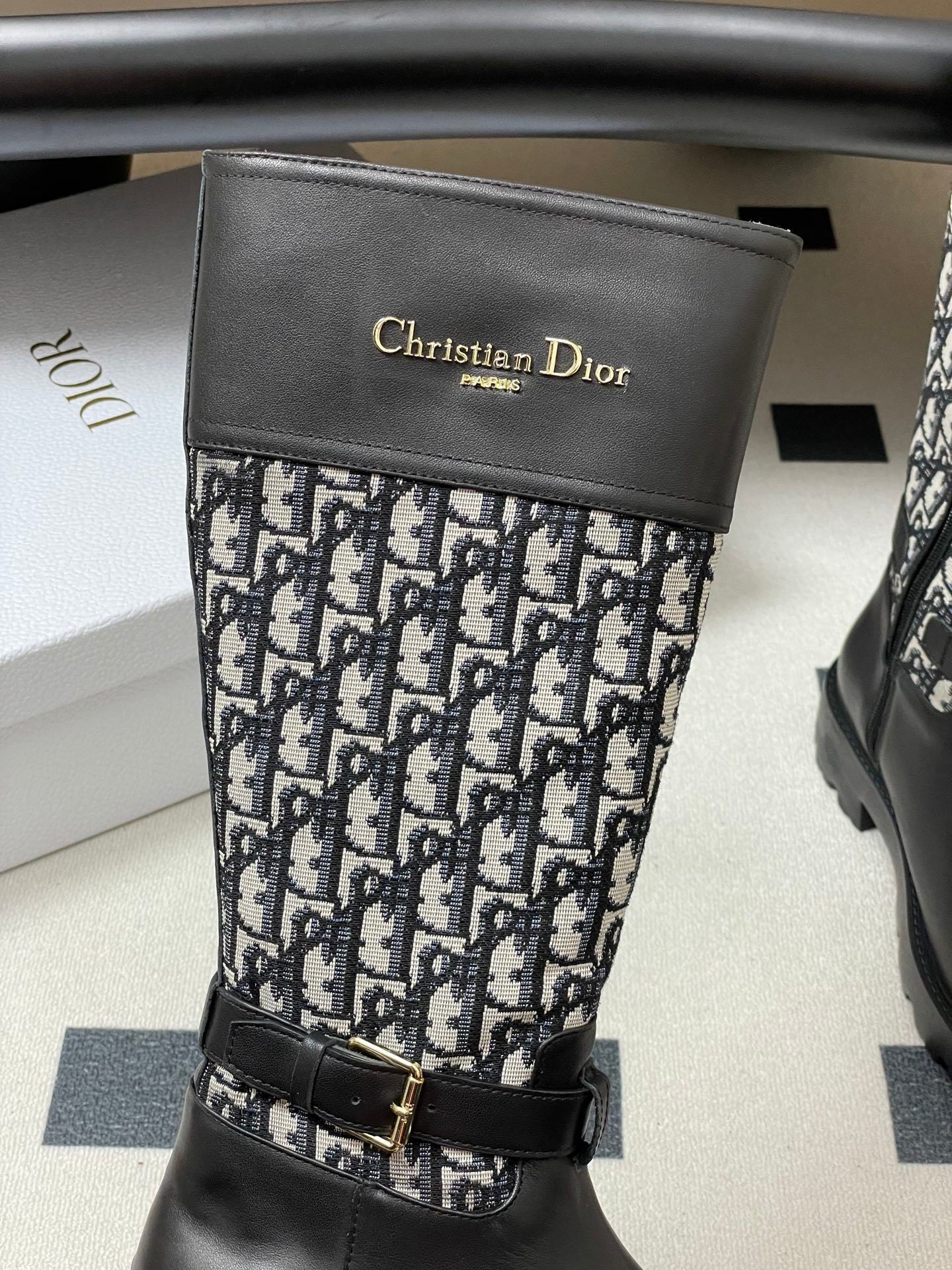 BLACK MID-CALF BOOTS WITH MONOGRAM FABRIC PANEL AND BUCKLE DETAIL
