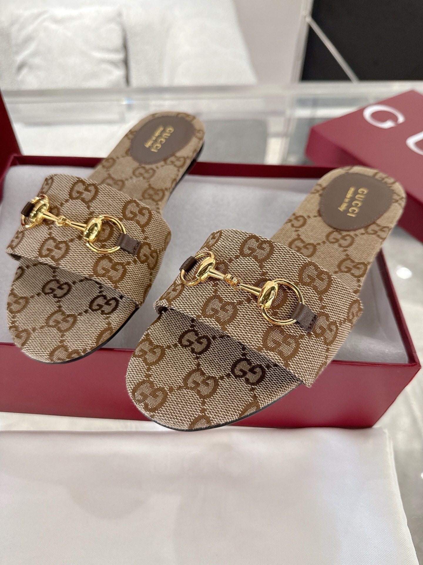 MONOGRAM CANVAS HORSEBIT SLIDE SANDALS